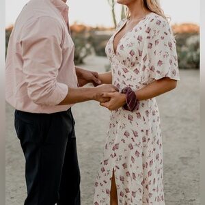 AFRM floral dress. Size medium short sleeve with slit dress